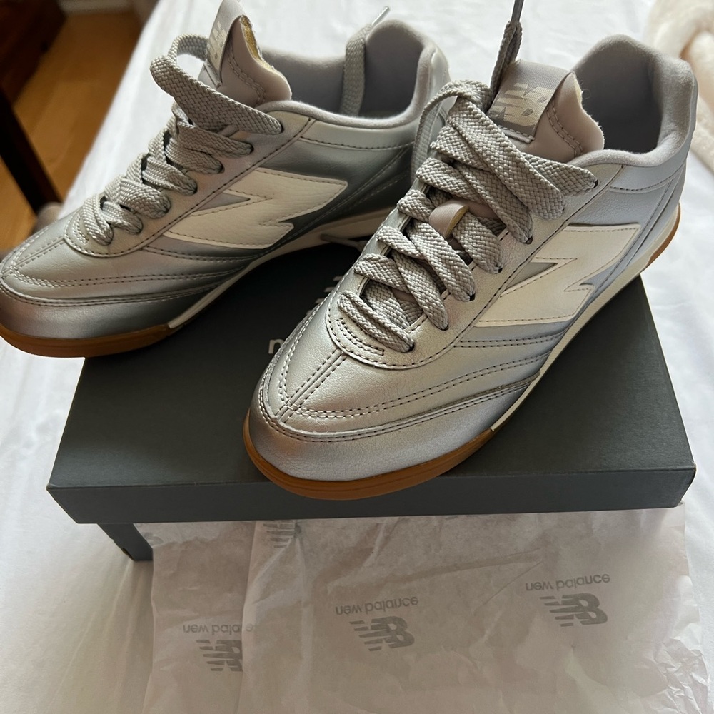 New Balance women's  Silver Athletic Sneakers